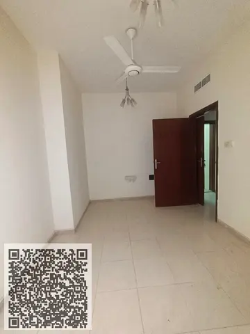 One-bedroom apartment with a living room for monthly rent in Ajman, Al Jurf. Annual rent AED 28,000. Deposit refundable AED 3,000 cash.