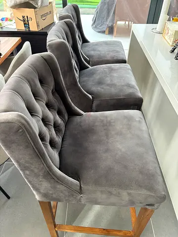 Set of 3 Grey Tufted High Chairs with Wooden Legs. Bought from Marina Home.
