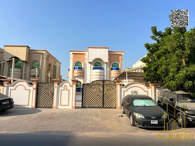Villa for sale in Ajman Al Rawda, 5 master bedrooms, majlis, living room, and maid's room. Freehold ownership for all nationalities. Bank financing av