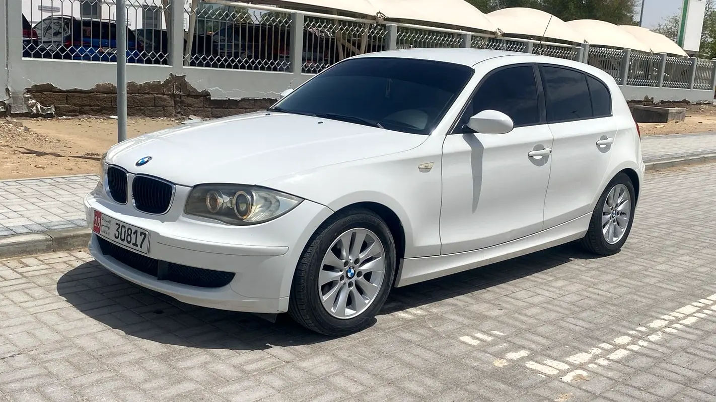 BMW 1-Series 2009 — photo 1 of 8