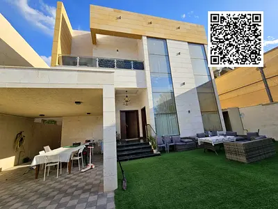 Stunning villa with a fantastic design for sale in Al Muwaihat, Ajman. Includes water, electricity, and air conditioning.