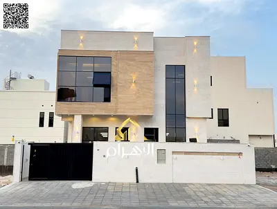Luxury villa for sale in Al Bahia area, featuring two floors and a rooftop terrace. Modern design, spacious living areas, reception halls, and compreh