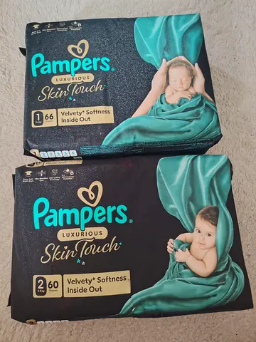 Pampers Luxurious Skin Touch diapers — Size 1 (66)  Size 2 (60), sealed packs