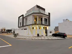 Corner villa for sale in Al Helio area, Ajman. Modern design, ground floor, first floor, and roof (5