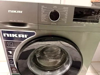 My Nikai front-load washing machine, good working condition with 5months company warranty remaining