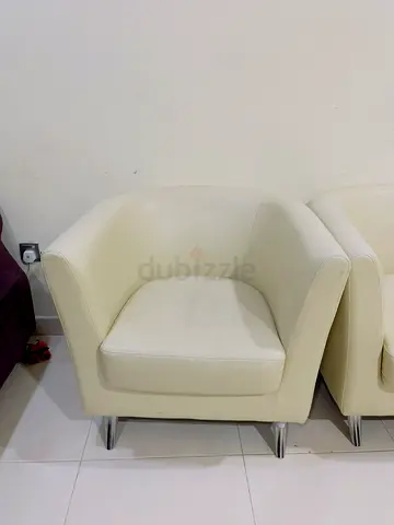 Cream tub armchair with chrome legs - used