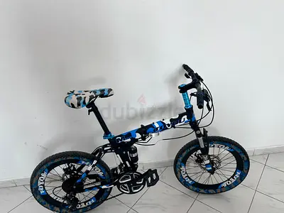 Blue folding kids/teen mountain bike - good condition
