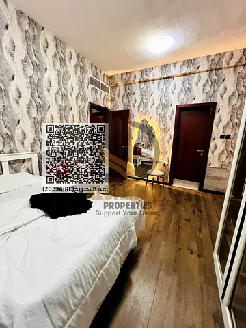 🏡 شقة غرفتين وصالة بإطلالة قصر في سيتي تاور – النعيمية 3