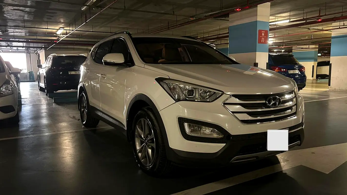 Hyundai Santa Fe 2015 — photo 1 of 14