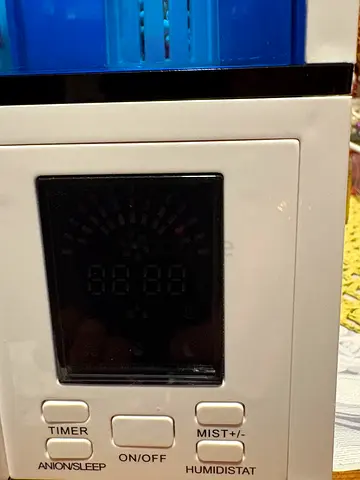 Digital humidifier with humidistat, timer and mist control