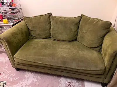 Green 2-seater sofa / loveseat - good condition
