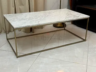 West Elm marble-top coffee table with a gold-finished metal frame