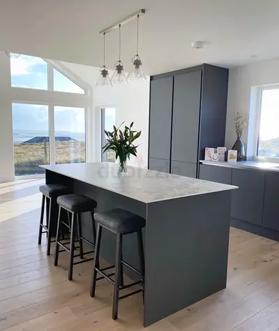 Modern grey kitchen island with marble-effect countertop