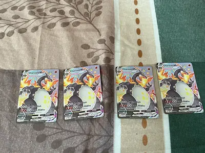 Set of 4 Charizard VMAX Pokémon TCG cards - used, good condition