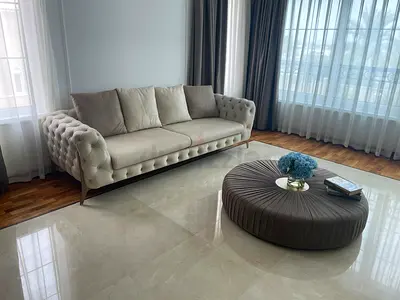 Beige tufted 3-seater sofa - used, well kept