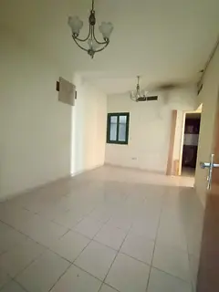 For rent in Al Nahda: 1BR + hall with balcony, central AC, practical layout, prime location near ser