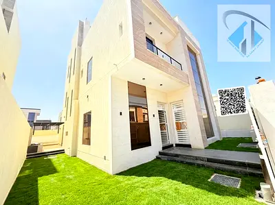 Villa for sale in Ajman, Al Yasmin area. Two floors and a roof terrace. 7 master bedrooms. Price includes air conditioning, electricity, and water