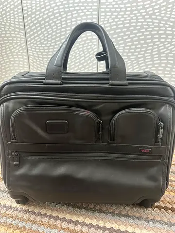 Tumi laptop and travel bag