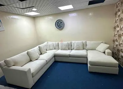 Beige color cratebarrel Ushape sofa