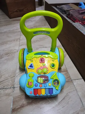 Baby push walker with musical activity panel - gently used