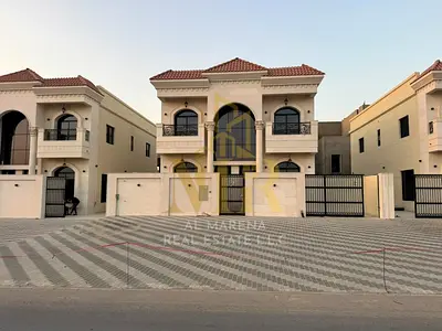Two-story villa with a swimming pool, price includes registration fees, freehold ownership in one of Ajman's most prestigious areas, available to all