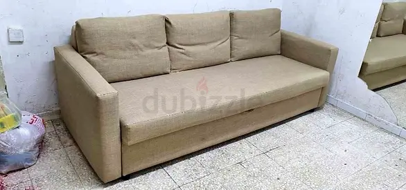 Beige 3-seater sofa bed good condition