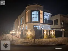 Corner Villa for sale | ajman| al zahia area | 5 master rooms, majlis, 2 halls, maid room| freehold