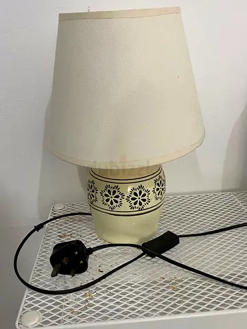Cream ceramic bedside table lamp with fabric shade