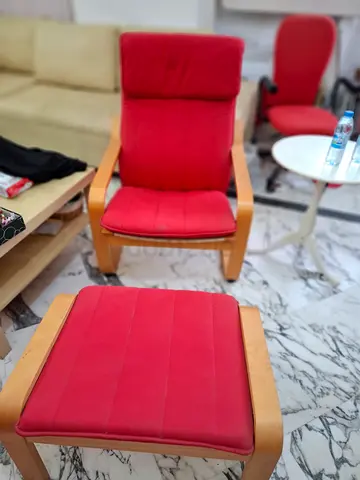 Red bentwood armchair with matching footstool