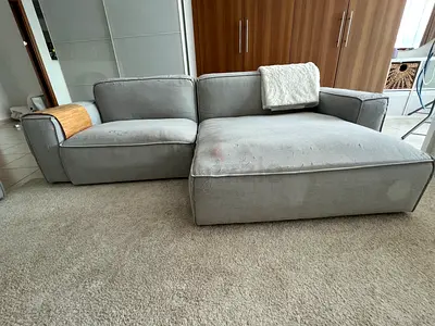 Pan Emirates L shaped couch