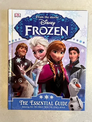 Disney Frozen: The Essential Guide — Hardcover, includes all song lyrics