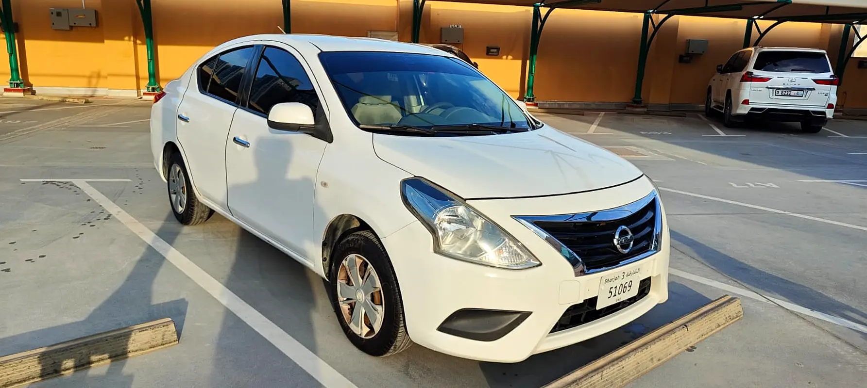 Nissan Sunny 2016 — photo 1 of 16