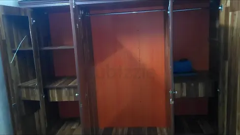 My large wooden 4 door wardrobe with shelves and hanging rail MDF material very good condition neat