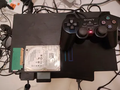 PS2 CONSOOL INSIDE 66 GAMES