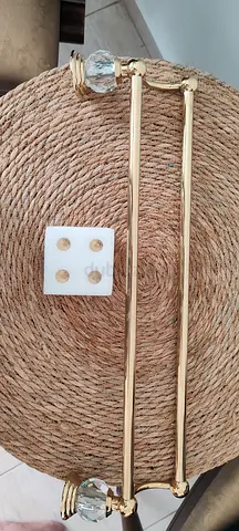 Gold double curtain rod set with crystal finials