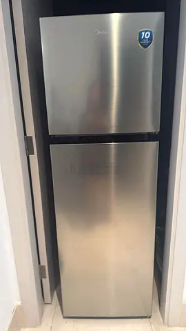 Top-freezer stainless steel refrigerator - working condition