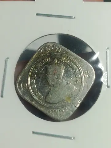 Vintage square collectible coin in 2x2 holder