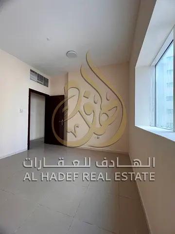 Two-Bedroom Apartment with Living Room for Rent in Al Nahda, Sharjah