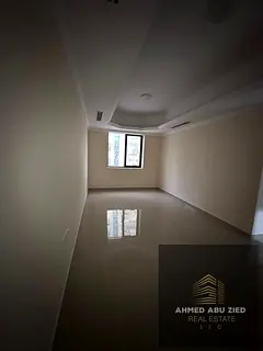 One bedroom and living room for rent in Al Rashidiya 1, opposite Nesto, prime location, AED 27,000