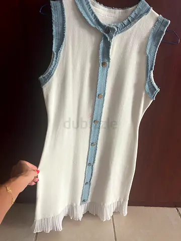 White sleeveless knit dress with denim-look trim in style of Sandro