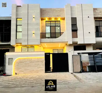 Villas for sale, including registration and ownership fees, in one of the most prestigious residential areas, with spacious areas and a strategic loca