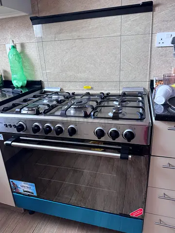 Cooking range : relocation sale ( super general oven with 5 gas cooker, silver Sgc 901 Fs