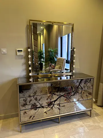 Lighted Mirrored Vanity Dresser with Floral Drawers.