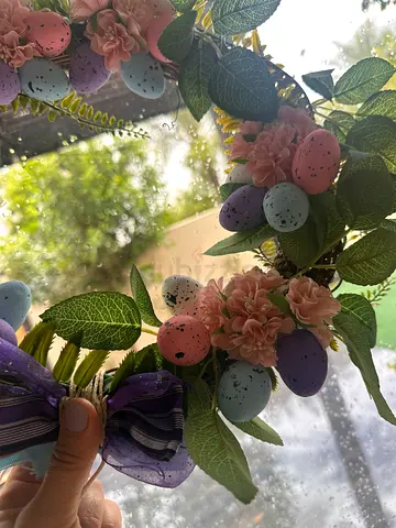 Easter wreath with wooden bunny decor and faux eggs