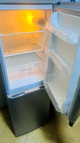 Silver refrigerator with bottom freezer - used, working condition, needs cleaning