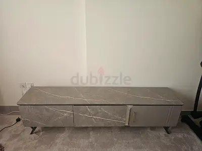 Grey marble-effect TV cabinet / entertainment unit