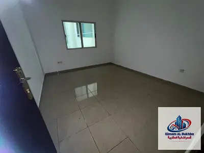 The best and most affordable one-bedroom apartment with a living room in Al Qasimia Al Mahatta, featuring central cooling and air conditioning, centra