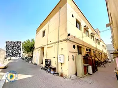 Al Jurf Industrial Area 2, Ajman: large plot of land with workers' accommodation and a plot suit