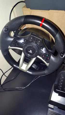 PlayStation-compatible racing wheel with pedals - good working condition