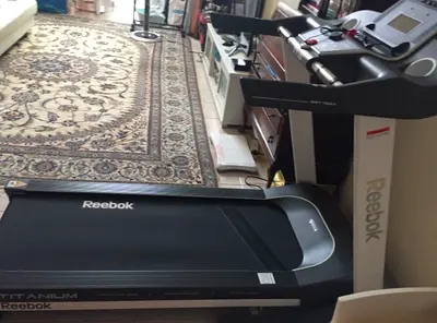 Titanium Reebok treadmill, excellent condition